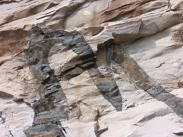 Folded mafic dyke in granulite, Eastern Ghats Belt, India.